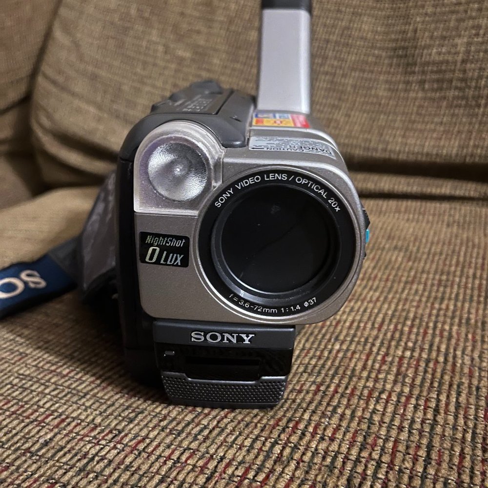 Sony Handycam CCD-TRV37 Camcorder, strap, charger, Manual and Carrying Case.